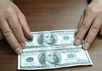В Баку обнаружены фальшивые доллары