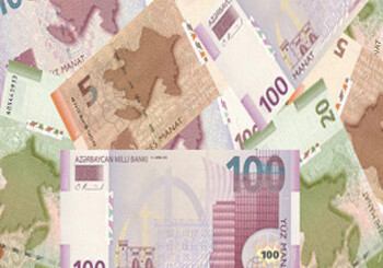 Манат укрепился относительно доллара и евро