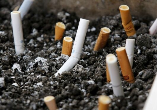 Табачные компании заплатят $12 млрд курильщикам