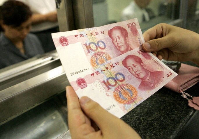 Центробанк Китая девальвировал юань