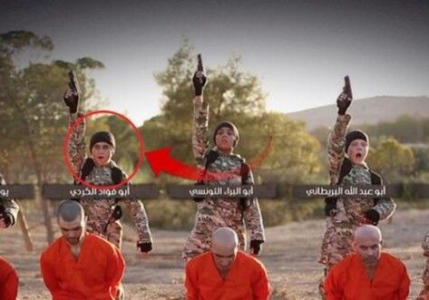 ИГ опубликовало видео, на котором дети казнят пленных курдов 