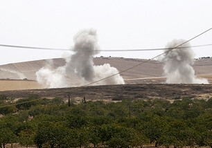 Курды при поддержке ВВС США начали наступление на столицу ИГ
