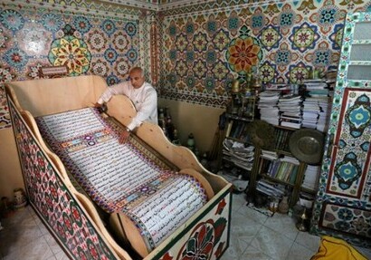 Египетский художник создал 700-метровый рукописный Коран (Фото)