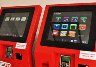 В терминалах MilliÖN запущен сервис платежей с использованием банковских карт