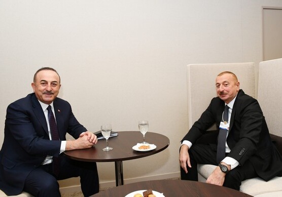 Президент Азербайджана встретился в Давосе с главой МИД Турции
