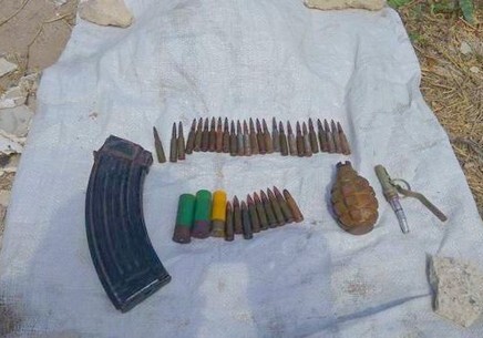 В Нардаране на мусорной свалке обнаружены граната и боеприпасы (Фото)
