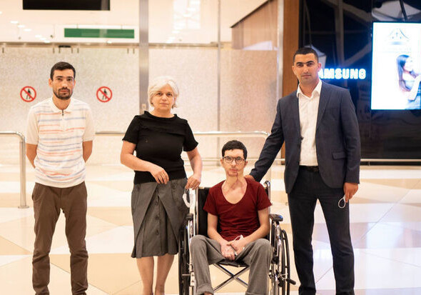 Семеро ветеранов, находившихся на лечении в Турции, вернулись домой (Фото)